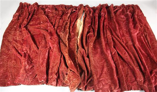 A pair of red velvet curtains